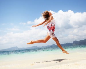 Woman running on beach